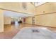 Spacious living area with hardwood floors, high ceilings, and large windows offering scenic views at 2400 N Griffin Dr, Leesburg, FL 34748