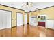 Spacious main bedroom features a luxurious tub, stylish vanity, and ample closet space, creating a serene retreat at 2400 N Griffin Dr, Leesburg, FL 34748