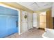 Utility Room featuring tile floor and multiple storage closets at 2400 N Griffin Dr, Leesburg, FL 34748