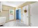 Utility Room featuring tile floor and access to the outside at 2400 N Griffin Dr, Leesburg, FL 34748