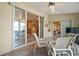 Enclosed patio with sliding glass doors offers a view inside and a ceiling fan for added comfort at 25129 Riverwalk Dr, Leesburg, FL 34748