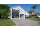 Home featuring a spacious covered carport with ample space for parking and storage at 2539 Caithness Way, Clermont, FL 34714