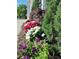 Beautiful landscaping featuring a mix of colorful flowers and lush greenery at 2539 Caithness Way, Clermont, FL 34714