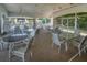 Outdoor patio area furnished with tables and chairs, perfect for gatherings and enjoying the fresh air at 2539 Caithness Way, Clermont, FL 34714