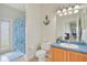 Bright bathroom with a shower and tub at 2641 Meadow View Ct, Kissimmee, FL 34746
