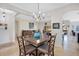 Open living space seamlessly connects dining and living areas, creating a comfortable home at 2641 Meadow View Ct, Kissimmee, FL 34746