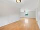 Bright and spacious living room features hardwood floors and neutral paint at 274 W Kings Hwy, Center Hill, FL 33514
