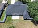 An aerial view displays the backyard with a patio and fenced property line at 31920 Parkdale Dr, Leesburg, FL 34748