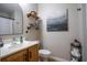 Modern bathroom with storage shelves, contemporary decor, and ample lighting at 31920 Parkdale Dr, Leesburg, FL 34748