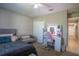 Comfortable bedroom featuring a bed, vanity, and closet space, perfect for relaxation and organization at 31920 Parkdale Dr, Leesburg, FL 34748
