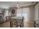 Charming dining area with wood flooring and modern lighting at 31920 Parkdale Dr, Leesburg, FL 34748
