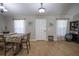 Inviting entryway features tile floors, white door, and natural light at 31920 Parkdale Dr, Leesburg, FL 34748