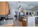Spacious kitchen with modern appliances and adjacent living area at 31920 Parkdale Dr, Leesburg, FL 34748