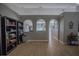 Cozy living room with archways, wood floors, and neutral paint at 31920 Parkdale Dr, Leesburg, FL 34748