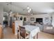 Open living area with kitchen, dining, and living room spaces for entertaining at 31920 Parkdale Dr, Leesburg, FL 34748