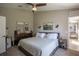 Comfortable bedroom with neutral tones, soft carpet, and dresser at 31920 Parkdale Dr, Leesburg, FL 34748