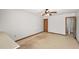 Bedroom with simple decor and attached bathroom, ready for personalized touches at 32132 Hickory Ln, Sorrento, FL 32776