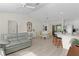 Spacious living area showcases an open layout, perfect for entertaining, with views of the kitchen and dining spaces at 334 Shiloh Ct, The Villages, FL 32162