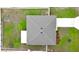 Aerial view of the house showcasing the roof, driveway, and surrounding yard at 3638 Sw 127Th Lane Rd, Ocala, FL 34473