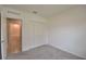 Bedroom featuring a closet, and access to the bathroom at 3638 Sw 127Th Lane Rd, Ocala, FL 34473