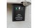 Close up of a SS100 Surge Protection electrical box, with green light showing system is working at 3638 Sw 127Th Lane Rd, Ocala, FL 34473