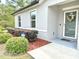 Attractive home exterior with well-maintained landscaping and inviting entryway at 3638 Sw 127Th Lane Rd, Ocala, FL 34473