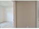 Hallway view leading to a bedroom with light-colored walls and doorways at 3638 Sw 127Th Lane Rd, Ocala, FL 34473