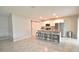Bright kitchen features granite countertops, stainless steel appliances, and island seating at 3638 Sw 127Th Lane Rd, Ocala, FL 34473