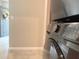 Close-up of a modern, front-load washer and dryer set with easy to read control panel at 3638 Sw 127Th Lane Rd, Ocala, FL 34473