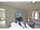 Living room features tile floors, and contemporary furnishings with an open floor plan at 3638 Sw 127Th Lane Rd, Ocala, FL 34473