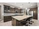 Spacious kitchen features a large island, stainless steel appliances and stylish pendant lighting at 40050 Darlington Ave, Lady Lake, FL 32159