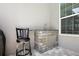 Built-in outdoor kitchen with barbecue area and seating space with backyard views at 40050 Darlington Ave, Lady Lake, FL 32159