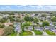 Aerial view shows the neighborhood at 507 Ventura Ct, The Villages, FL 32159