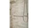 Close-up of the shower, featuring a marble-tile wall at 507 Ventura Ct, The Villages, FL 32159