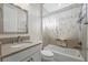 Clean bathroom featuring a shower/tub combo and neutral color scheme at 6988 Lawrenceville Way, The Villages, FL 34762