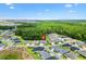 A lovely neighborhood with lush green spaces, beautiful homes, and scenic views of the surrounding nature at 6988 Lawrenceville Way, The Villages, FL 34762