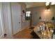 Bathroom showcasing double sinks, granite countertops, and a glass-enclosed shower at 709 Calabria Way, Howey In The Hills, FL 34737