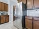 Kitchen featuring stainless steel refrigerator and stainless appliances at 718 Lake Douglas Dr, Groveland, FL 34736