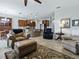 Open floor plan showing the living room, dining area and kitchen with a central island at 718 Lake Douglas Dr, Groveland, FL 34736