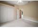 Bedroom featuring built in closet and pool view at 7249 Chesterhill Cir, Mount Dora, FL 32757