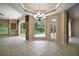 Bright dining area with chandelier and view of pool at 7249 Chesterhill Cir, Mount Dora, FL 32757