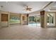 Bright living room featuring sliding glass doors that open to a pool area at 7249 Chesterhill Cir, Mount Dora, FL 32757
