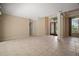 Spacious living room with tile flooring, natural light, and high ceilings at 7249 Chesterhill Cir, Mount Dora, FL 32757