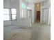 Open-concept living room with lots of light and access to other areas at 739 Cortez Ave, The Villages, FL 32159