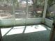 View of the screened in back porch at 739 Cortez Ave, The Villages, FL 32159