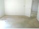 An empty bedroom with neutral carpet, paint, and baseboards awaits your vision for an inviting living space at 739 Cortez Ave, The Villages, FL 32159