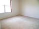 This bedroom offers natural light from its window and a blank canvas to create your ideal retreat at 739 Cortez Ave, The Villages, FL 32159