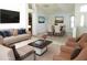 Bright living room with contemporary furniture, high ceilings and neutral color palette with plenty of natural light at 739 Cortez Ave, The Villages, FL 32159