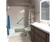 Neutral colored bathroom with a shower and tub combo, a modern vanity, and fixtures at 8431 Sw 93Rd Pl # F, Ocala, FL 34481