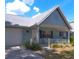 Lovely single-story home boasting a quaint covered porch and beautifully maintained landscaping at 8431 Sw 93Rd Pl # F, Ocala, FL 34481